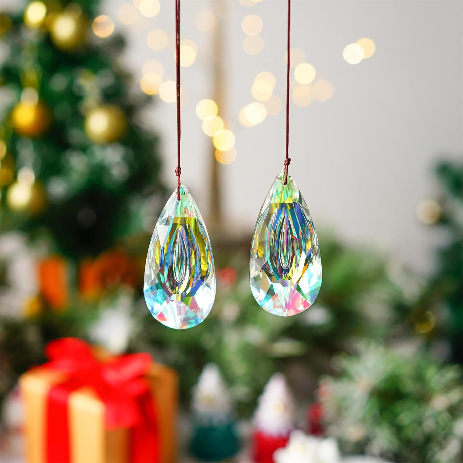 VOT Certified 3.5-inch crystal prism sun catcher hanging with rainbow reflections on a window.