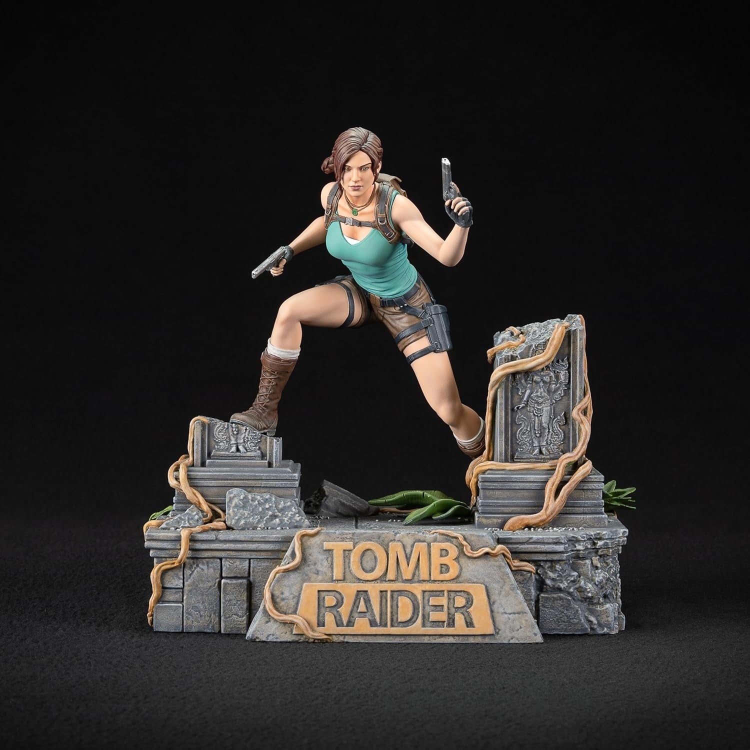 Dark Horse Deluxe Tomb Raider Lara Croft PVC figure shown standing in an action pose with detailed sculpting and vibrant colors.