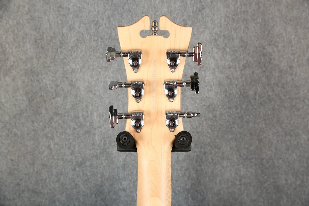D'Angelico Premier Bedford guitar with a full back in rich oxblood red finish and classic design.