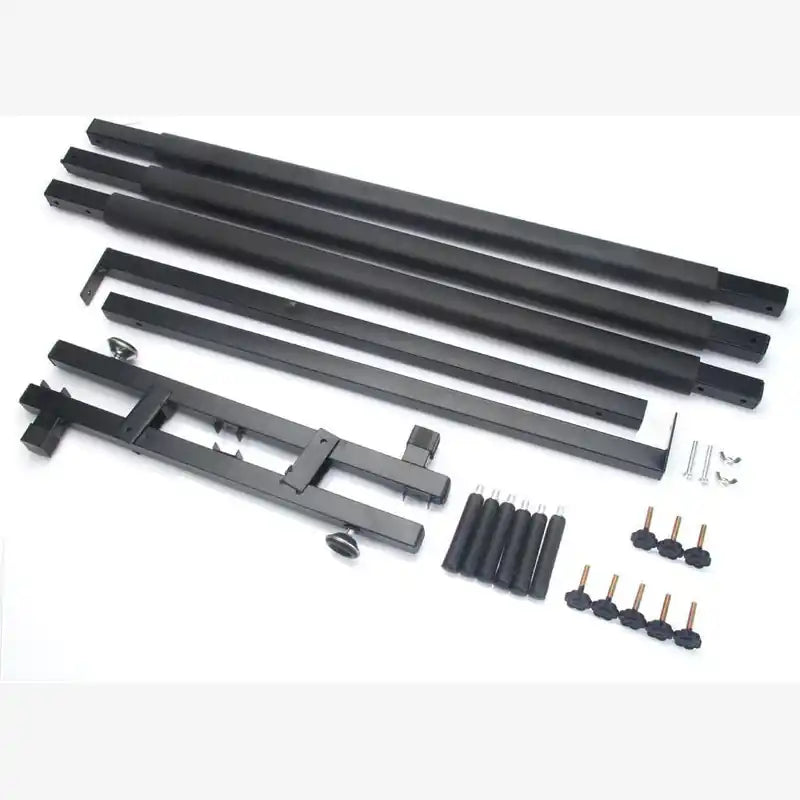 Black metal stand assembly with multiple long rails, a mounting bracket, leveling feet, and small hardware pieces, laid out on a white background.