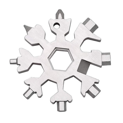 Metal snowflake-shaped multi-tool on a white background