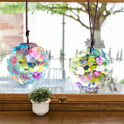 VOT Certified crystal sun catcher with Datura-shaped prisms hanging from a delicate string, designed to catch and reflect sunlight beautifully.
