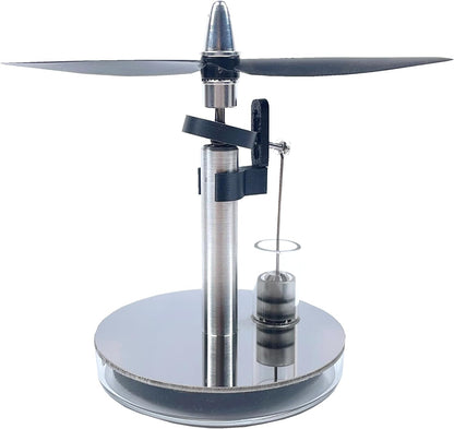 Mini Stirling low-temperature engine by Stirling, showing the compact metal device with moving pistons and intricate components.