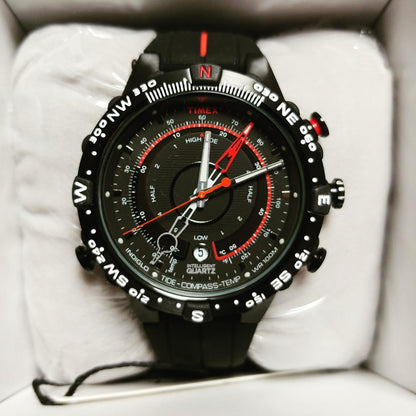 Timex Quartz Tide-Temp-Compass Watch showing the dial with tide, temperature, and compass features on a black strap.