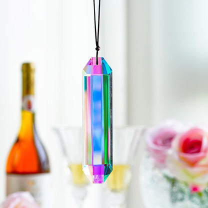 Large 5-inch VOT Certified crystal sun catcher prism hanging with colorful light reflections and intricate faceted design.