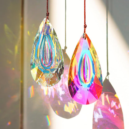 VOT Certified 3.5-inch crystal prism sun catcher hanging with colorful reflections on a window.