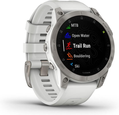 White Garmin smartwatch with a display showing various activities on a white background. Beirut , Lebanon
