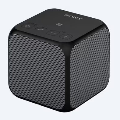 Black Sony speaker on a light gray background