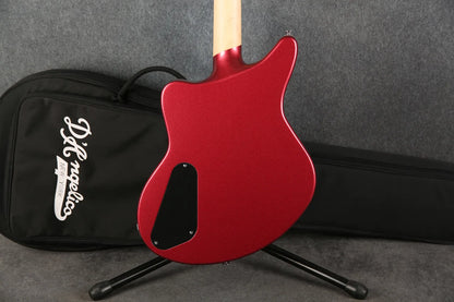 D'Angelico Premier Bedford guitar with Oxblood red body, shown from a front angle highlighting its sleek design and wood finish.
