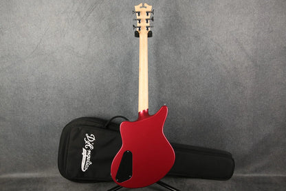 D'Angelico Premier Bedford guitar with oxblood red body, side detail showcasing sleek design and craftsmanship.