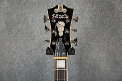 D'Angelico Premier Bedford guitar in oxblood red with a natural wood finish, shown with a gig bag, front view.