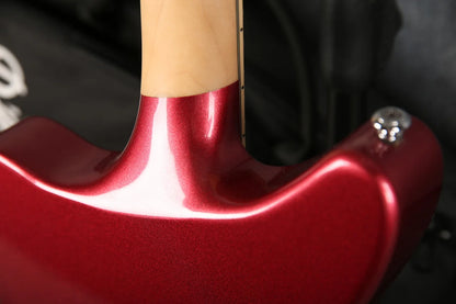 Close-up of D'Angelico Premier Bedford guitar neck joint in oxblood red finish, showcasing craftsmanship and high-quality wood details.