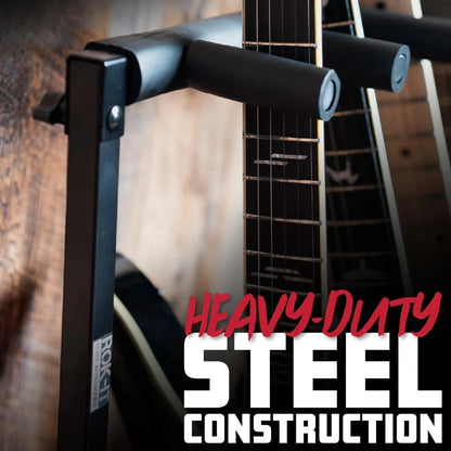 Close-up of a black heavy-duty steel guitar stand holding a guitar neck, with large overlaid text reading 'HEAVY-DUTY STEEL CONSTRUCTION'.