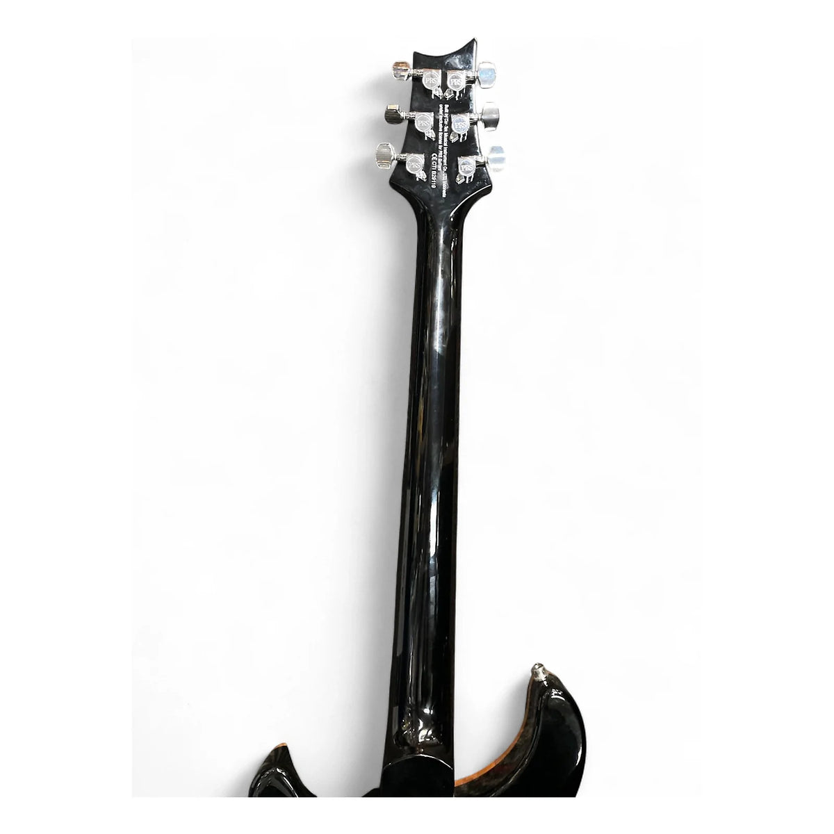 Close-up of the headstock and upper neck of a glossy black electric guitar against a plain white background.