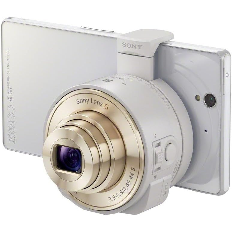 Sony digital camera with a white body and a prominent gold-toned lens ring, shown from a three-quarters angle on a white background.