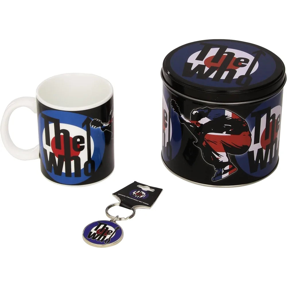 A 'The Who' merchandise set featuring a black ceramic mug with a white handle, a matching black metal tin, and a small round keychain, all printed with the band's logo and a guitarist graphic on a white background.