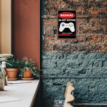 VOT Certified Game in Progress tin sign with warning do not disturb message, mounted on a brick wall for gaming room decor.