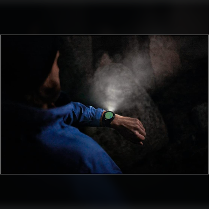 Garmin Fenix 7 Pro Solar GPS smartwatch on a user's wrist showing a digital display with fitness tracking features.